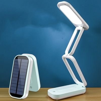 STPのプラスチック射出成形の太陽再充電可能で取り外し可能なリチウム電池折り畳み式LEDの目の保護の電気スタンド